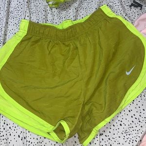 green nike shorts, size small